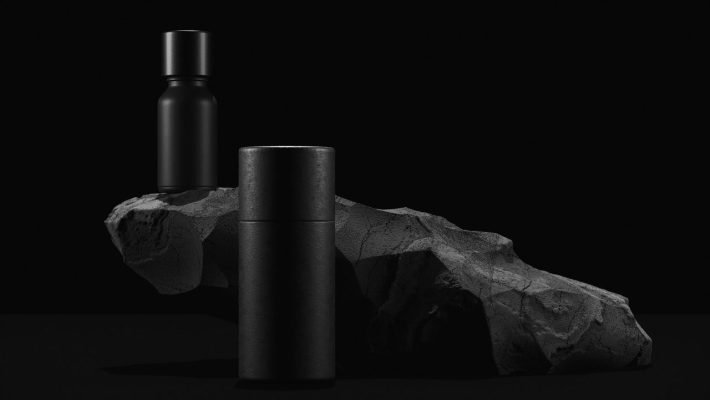 bottle-of-essential-massage-oil-on-stone-beauty-treatment-minimal-black-design-packaging-mock-up.jpg